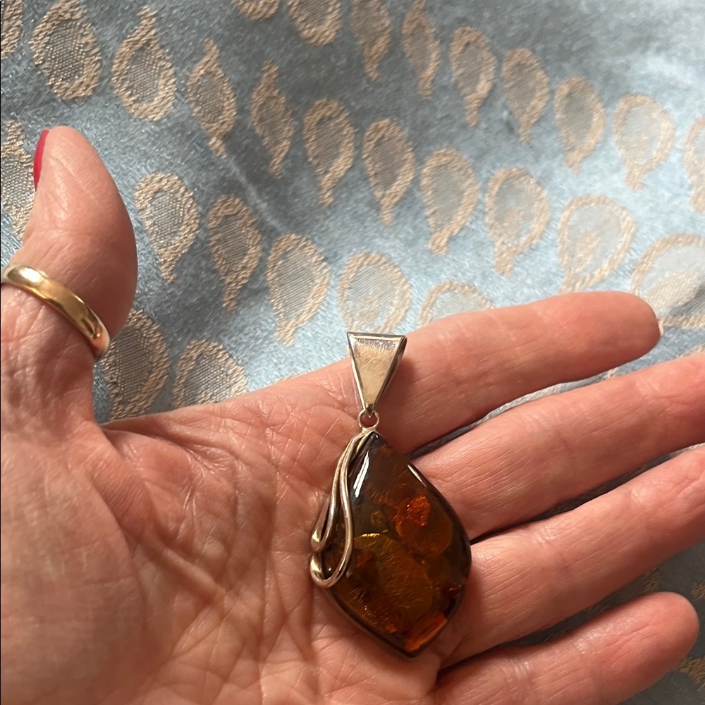 Flawless Amber 2 inches teardrop pendant in Sterling Silver setting